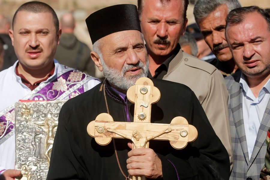Asyrische christenen in Mosul nemen hun kerk opnieuw in gebruik nadat die door
ISIS gebruikt was als opslagplaats.
