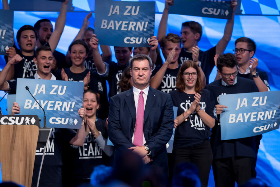 15 September 2018, Bavaria, Munich: Markus Söder (CSU), Minister President of
Bavaria, is standing on stage after his speech at the CSU party conference in
the Postpalast together with supporters who are giving “Yes to Bavaria” signs.
Photo: Sven Hoppe/dpa

Reporters / DPA