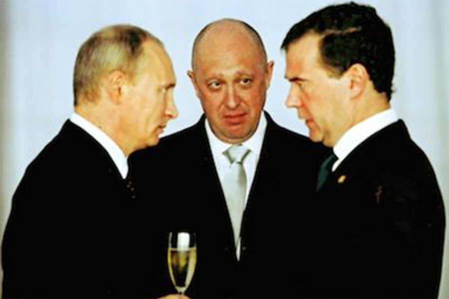 vlnr.: Poetin, Prigozhin en Medvedev
